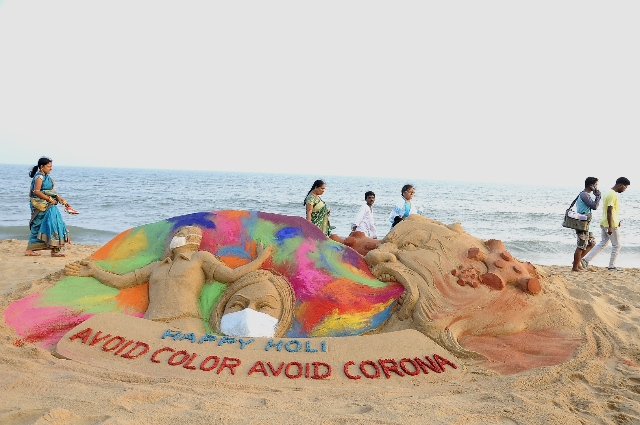 Celebrate Holi without Color Awareness About Corona Virus through his Sand Art